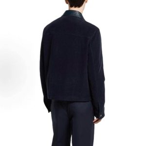 Back view of the dark navy Gucci Interlocking G Corduroy Jacket highlighting the straight hem and contrasting glossy collar.