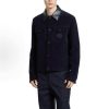 Front view of the Gucci Interlocking G Corduroy Jacket in dark navy featuring a button front, flap chest pockets, and a contrasting collar.
