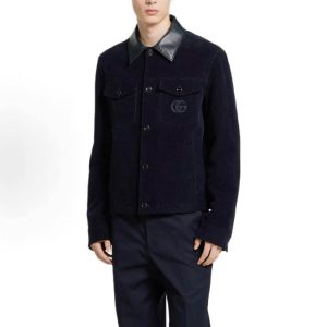 Front view of the Gucci Interlocking G Corduroy Jacket in dark navy featuring a button front, flap chest pockets, and a contrasting collar.