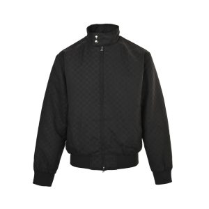 Front view of the black Gucci GG Monogram Zip-Up Jacket showcasing a subtle tonal pattern, front zipper, and double snap-button collar.