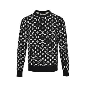 Louis Vuitton Full Monogram Jacquard Crewneck in Black and White (4) Front view of the black and white Louis Vuitton monogram sweater featuring solid black ribbed trims at the collar, cuffs, and waist.