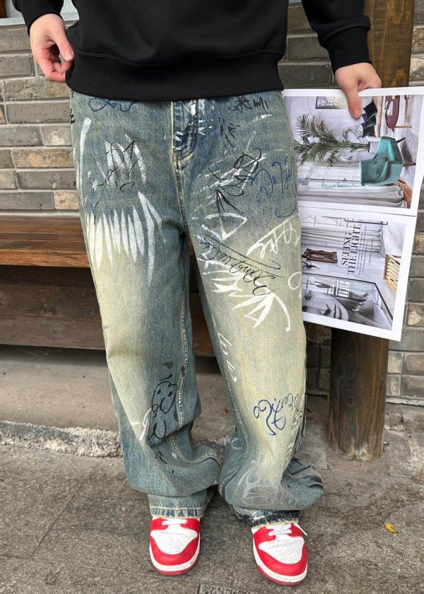 Balenciaga Graffiti Baggy Jeans in Faded Blue (2) Balenciaga Graffiti Baggy Jeans in Faded Blue