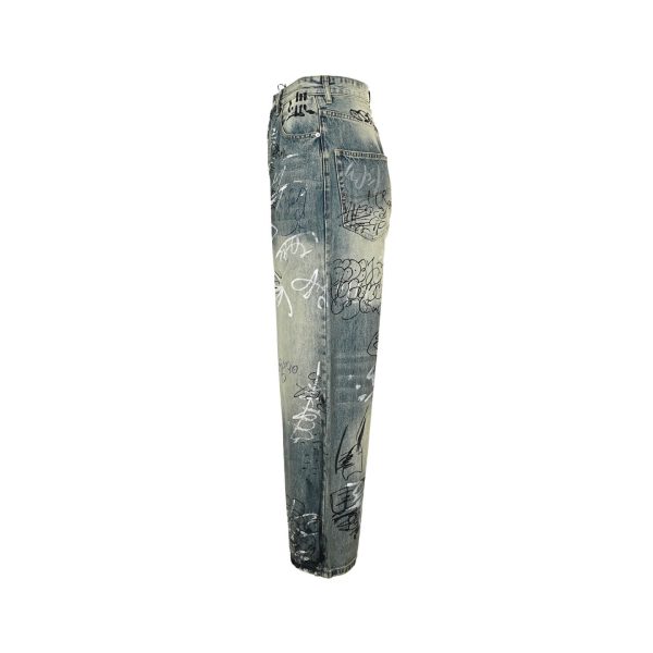 Balenciaga Graffiti Baggy Jeans in Faded Blue (4) Side profile view of the wide-leg Balenciaga graffiti jeans highlighting the continuous hand-drawn style graphics along the outer seam