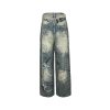 Balenciaga Graffiti Baggy Jeans in Faded Blue (6) Back view of the faded blue Balenciaga Graffiti Baggy Jeans showing all-over black and white scribble graphics and a black waistband patch.