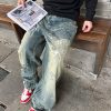 Balenciaga Graffiti Baggy Jeans in Faded Blue (9) Balenciaga Graffiti Baggy Jeans in Faded Blue