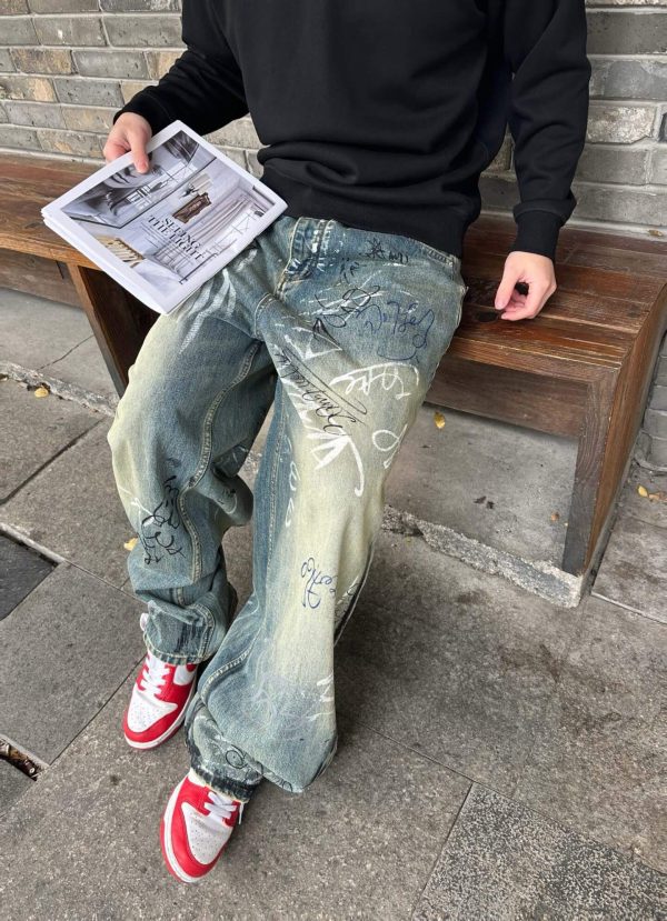 Balenciaga Graffiti Baggy Jeans in Faded Blue (9) Balenciaga Graffiti Baggy Jeans in Faded Blue