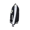 Louis Vuitton Denim Velvet Souvenir Jacket in Midnight Blue and White (4) Side profile view highlighting the contrasting white sleeve, striped ribbed cuffs, and textured denim velvet body.