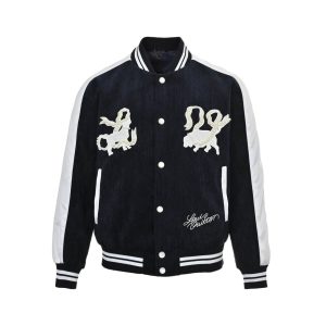 Louis Vuitton Denim Velvet Souvenir Jacket in Midnight Blue and White (7) Front view of the Louis Vuitton souvenir jacket featuring white sleeves, snap buttons, and pearl-embellished lion chest appliqués.