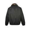 Back view of the black Louis Vuitton by Tyler, the Creator Cotton Aviator Jacket showing the colorful monogram collar and elastic hem.