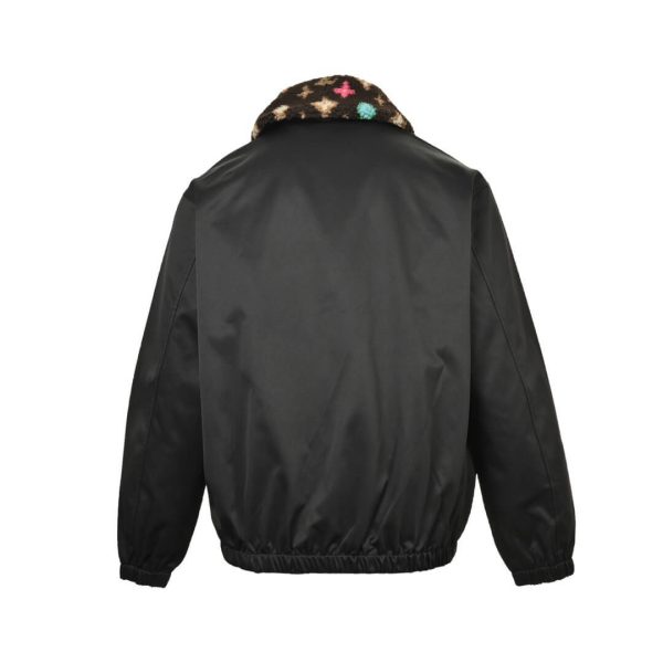 Back view of the black Louis Vuitton by Tyler, the Creator Cotton Aviator Jacket showing the colorful monogram collar and elastic hem.